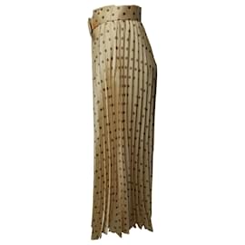 Sandro-Jupe longue plissée avec ceinture Sandro en soie dorée-Doré