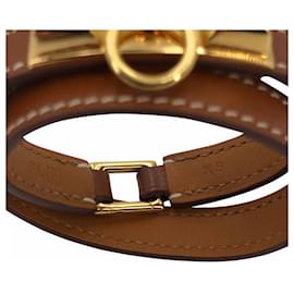 Hermès-Bracelet tour doublé Hermès Rivale en cuir doré et boucle ardillon-Marron