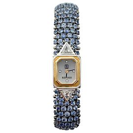 Montre Repossi, deux ors, saphirs, diamants. Autre