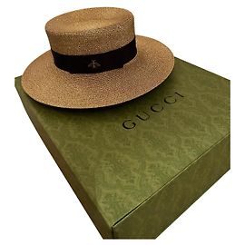 Gucci Chapeaux Doré