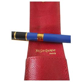Yves Saint Laurent Stylo avec étui cuir. Bijouterie dorée