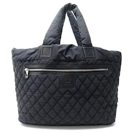 Chanel-CHANEL COCOON XXL TRAVEL BAG BLACK QUILTED NYLON CANVAS HAND BAG-Black