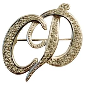 Dior-Monogramm-Brosche Silber