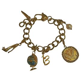 Pulseira dourada com vários charms do mapa-múndi Dolce & Gabbana Dourado
