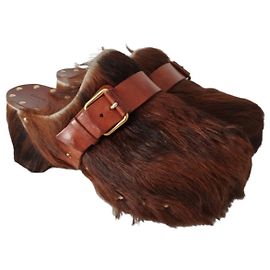 Céline Mules Celine en vison et cuir marron Marron