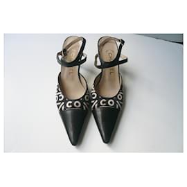 Chanel-Sapatos bimatéria CHANEL em couro e tecido com monograma Coco T37,5 ISTO; b.E-Preto