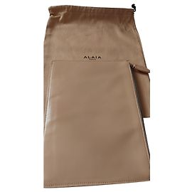 Pochette Alaïa en cuir beige Beige