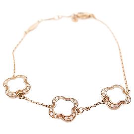NOVE BRACCIALE MAUBOUSSIN TREFLE DE TOI 3 MODELLI IN ORO ROSA DI PERLE E DIAMANTI D'oro