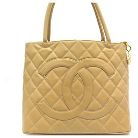 BOLSA DE MÃO ACOLCHOADA DE COURO CHANEL CABAS SHOPPING MEDALHÃO CAVIAR Bege