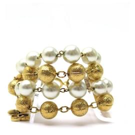 Chanel-PULSEIRA VINTAGE CHANEL 4 fileiras 1990 PÉROLAS E BOLAS DOURADAS T20 EM JÓIA DE METAL-Dourado