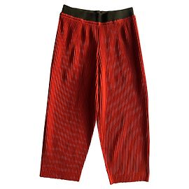 Issey Miyake calças vermelhas plissadas Vermelho