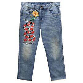 Vaqueros de pernera cónica con aplique de serpiente Gucci en denim azul Otro
