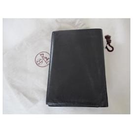 Hermès-Black leather wallet.-Black