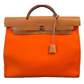 Hermès-Su bolso 39-Naranja