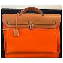 Hermès-Su bolso 39-Naranja