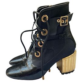 Sublime original Dior black and gold ankle boots Black Golden Gold hardware