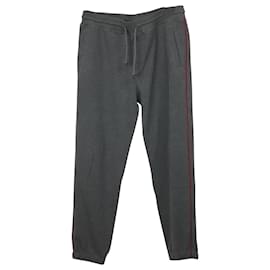 Brunello Cucinelli-Brunello Cucinelli Pantalon de survêtement à passepoil contrasté en coton gris-Gris