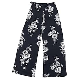 Alexander Mcqueen-Pantalones de pernera ancha con diseño floral en poliéster negro de McQ by Alexander McQueen-Negro