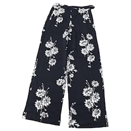 Alexander Mcqueen-Pantalones de pernera ancha con diseño floral en poliéster negro de McQ by Alexander McQueen-Negro