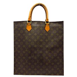Louis Vuitton Sac plat Marrom