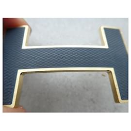 Hermès-Hermès belt buckle, quiz model, in gold and black brass-plated steel-Gold hardware