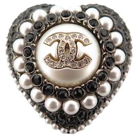 NEUE CHANEL BROSCHE LOGO CC HERZ UND SCHWARZER STRASS IN GOLDMETALL NEUE BROSCHE Schwarz