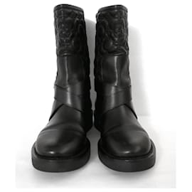 Louis Vuitton-Louis Vuitton Monogram Embossed boots-Black