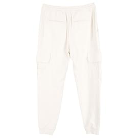 Brunello Cucinelli-Pantalones Brunello Cucinelli con bolsillos cargo en algodón color crema-Blanco,Crudo