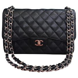 Chanel Classica patta foderata di caviale jumbo Nero Silver hardware
