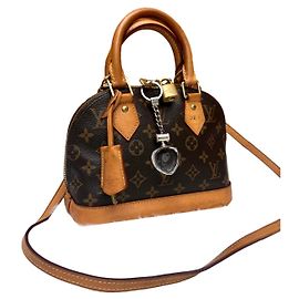 Bolsa de mão Louis Vuitton Alma Marrom de algodão Marrom