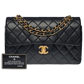Chanel-Le "Must Have"Sac Chanel Timeless 23 cm with lined flap in black quilted lambskin,-Black