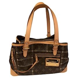 Louis Vuitton-Riveting M40140 Allocated-Brown