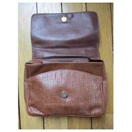 Courreges-Tan leather bag.-Caramel
