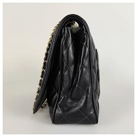Chanel-Chanel Timeless Classica 30 CM lined flap turn lock bag in black leather-Black