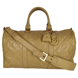 Chanel-Chanel quilted travel bag in beige patent leather-Beige