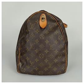 Louis Vuitton-Louis Vuitton Keepall 50 Monogram travel handbag-Brown