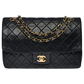 Chanel-Chanel Timeless / Classique handbag 27cm with flap in black quilted lambskin-Black