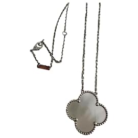 Van Cleef & Arpels-Magic Alhambra mother-of-pearl pendant, WHITE GOLD. VAN CLEEF & ARPELS-Silvery