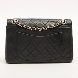 Chanel-Petit sac à rabat Chanel en cuir noir-Noir