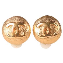 Boucles d'oreilles à clip Chanel dorées Doré