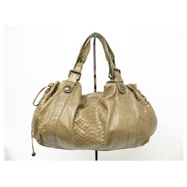 Gerard Darel Le Buci Bag in Cream