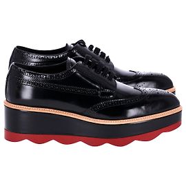 Mocassins Plateforme Prada Brogue en Cuir Noir Noir