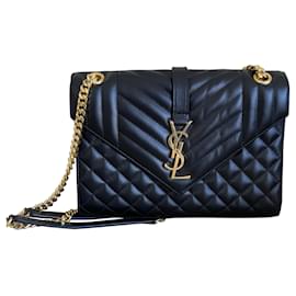 Saint Laurent-bolso tipo sobre de Yves Saint-Laurent-Negro