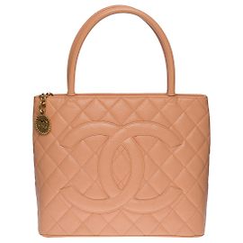 Bolsa medalhão CHANEL em couro rosa - 100733 Rosa