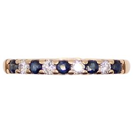 Autre Marque Yellow gold ring 750%o sapphire and diamond half wedding ring Gold hardware