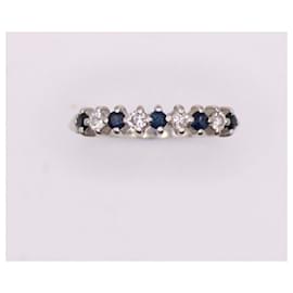 Autre Marque-White gold wedding ring 750%o set with sapphires and diamonds-Silver hardware
