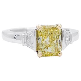 inconnue Fancy Intense Yellow diamond ring, two golds. Other