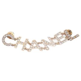 Broche Chanel em Aço Dourado e Strass Dourado