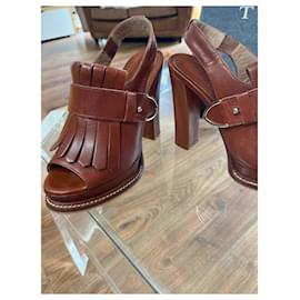 Autre Marque-Cognac color shoe, wear only once, no wear points , heels of 12 cm, but great comfort because compensated shoes-Cognac