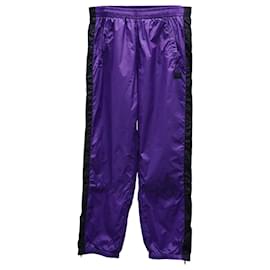 Acne-Pantalones de chándal cónicos en nailon morado a rayas Phoenix de Acne Studios-Púrpura